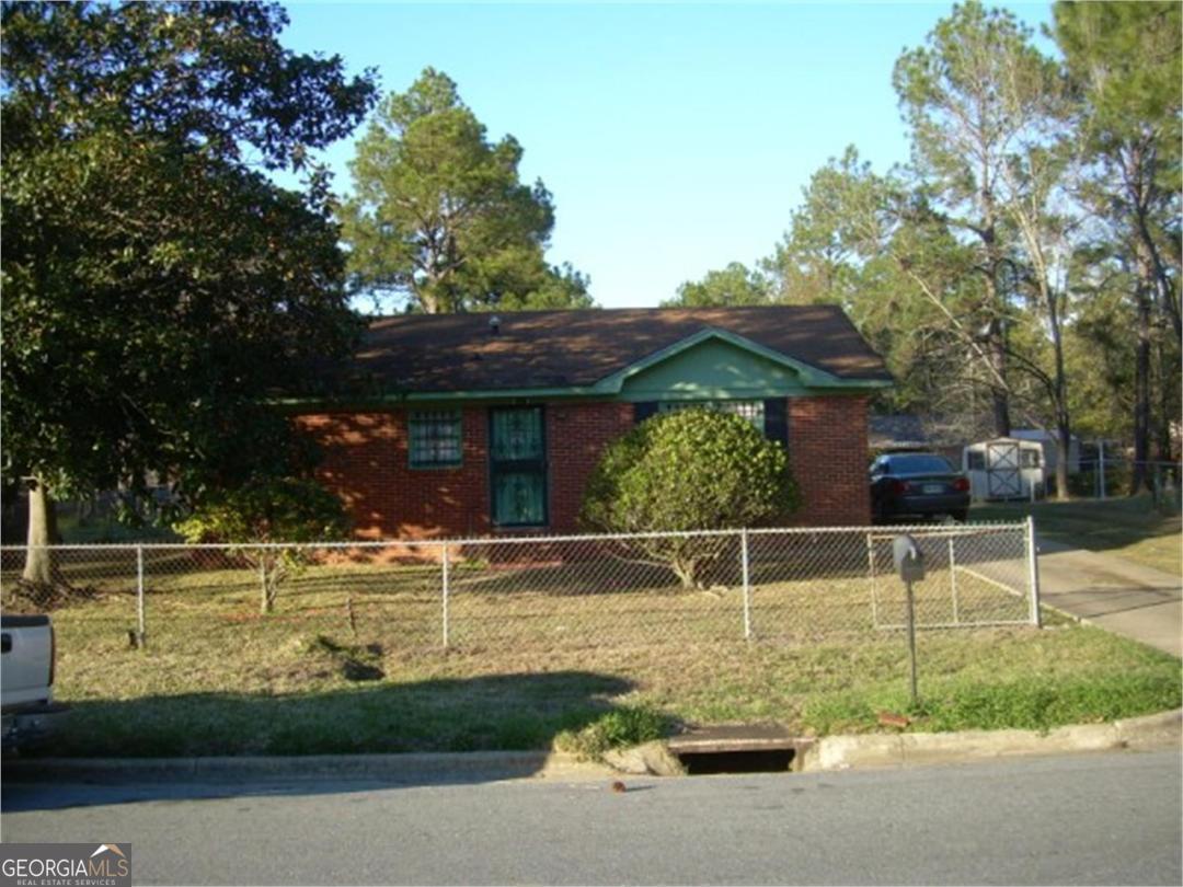 a view of a house with a big yard