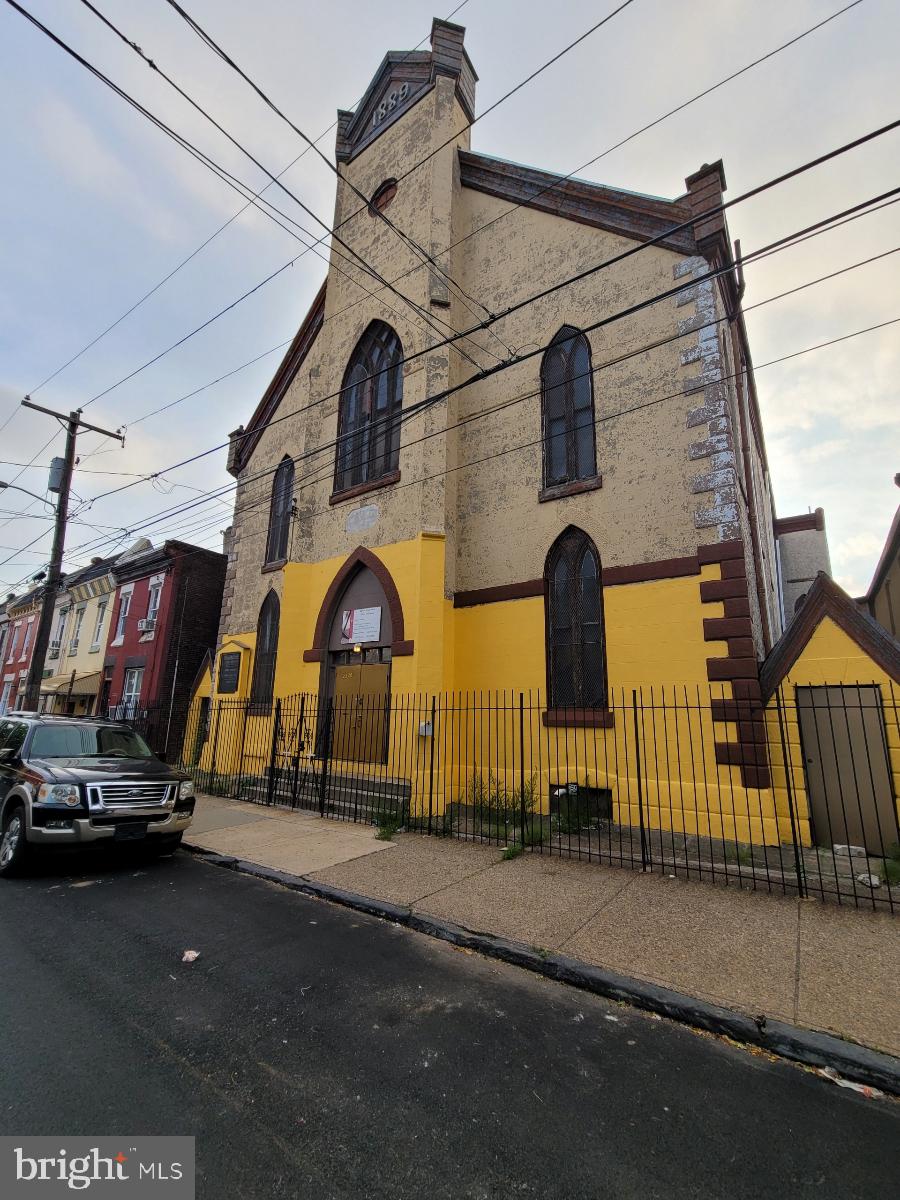 a view of a building with a street