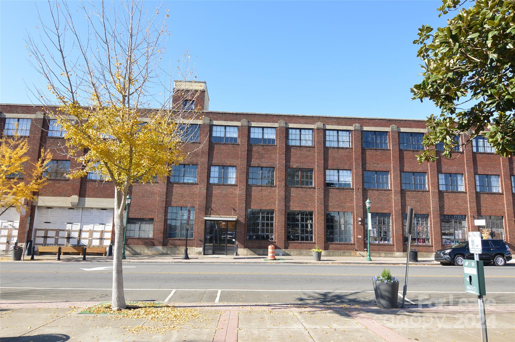 a front view of a building with street view