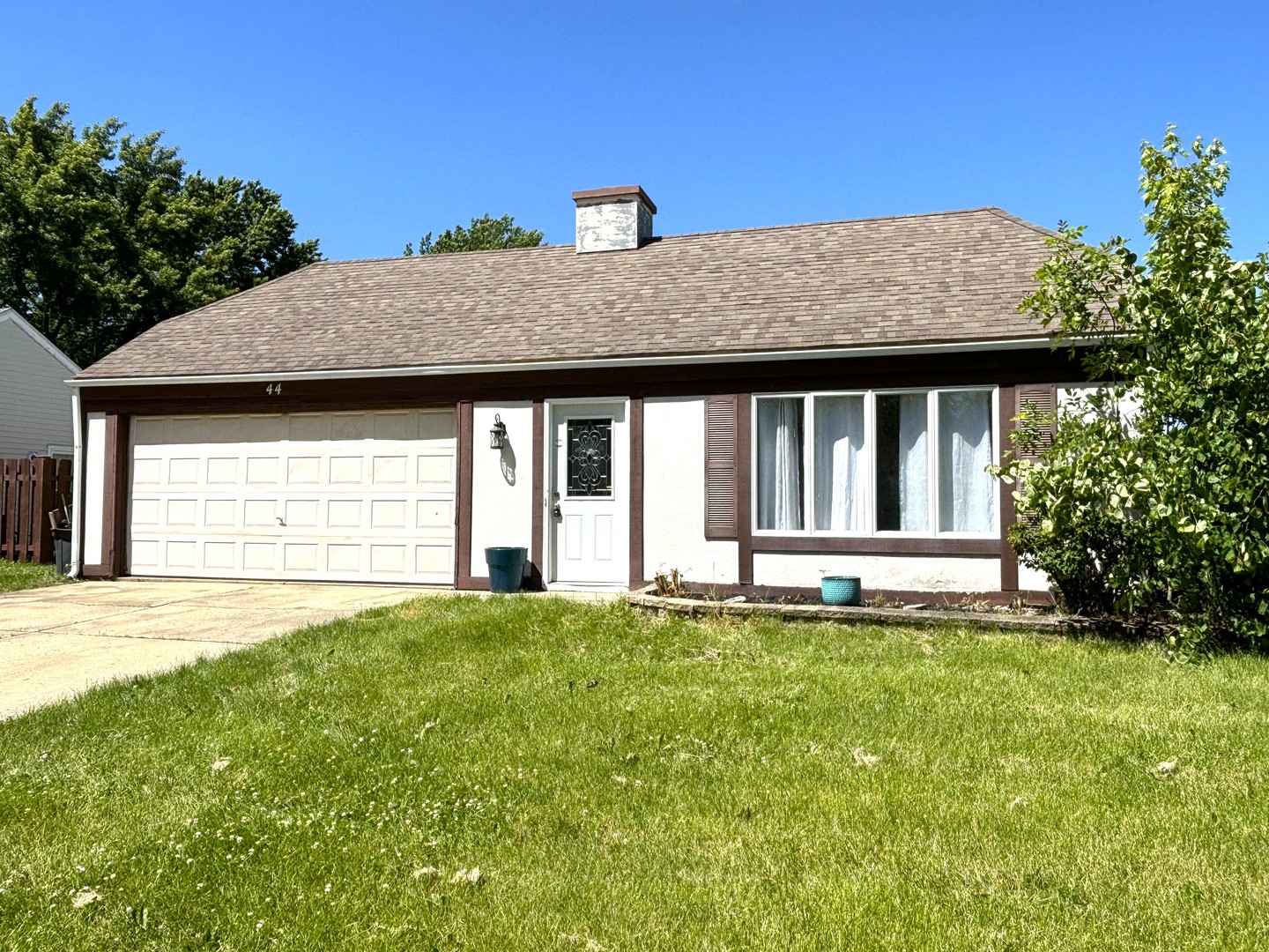 a house with garden in front of it