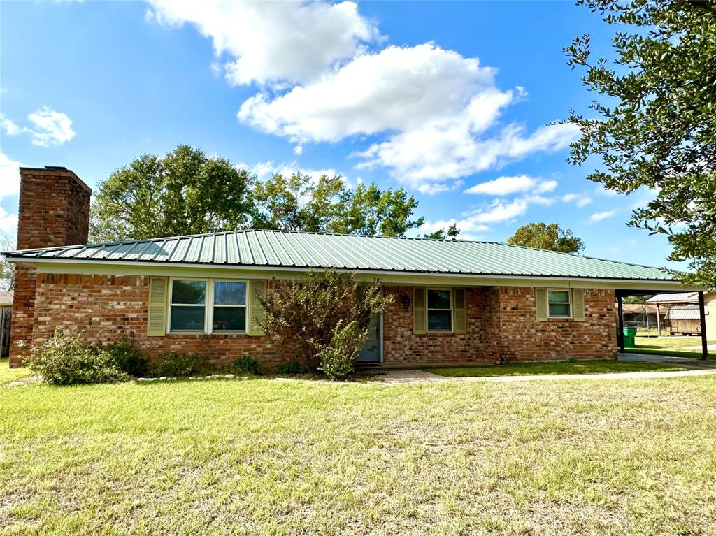 front view of house with a yard