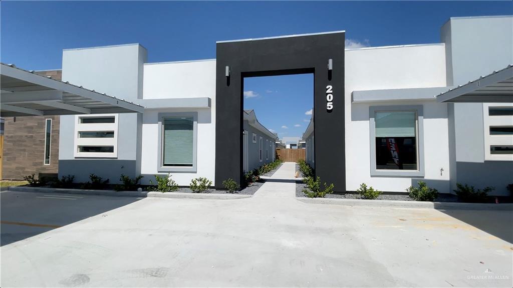 a view of a house with a patio