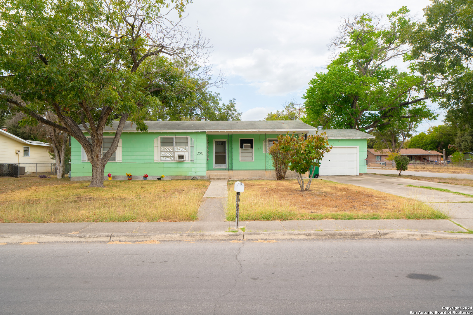 front view of a house with a street