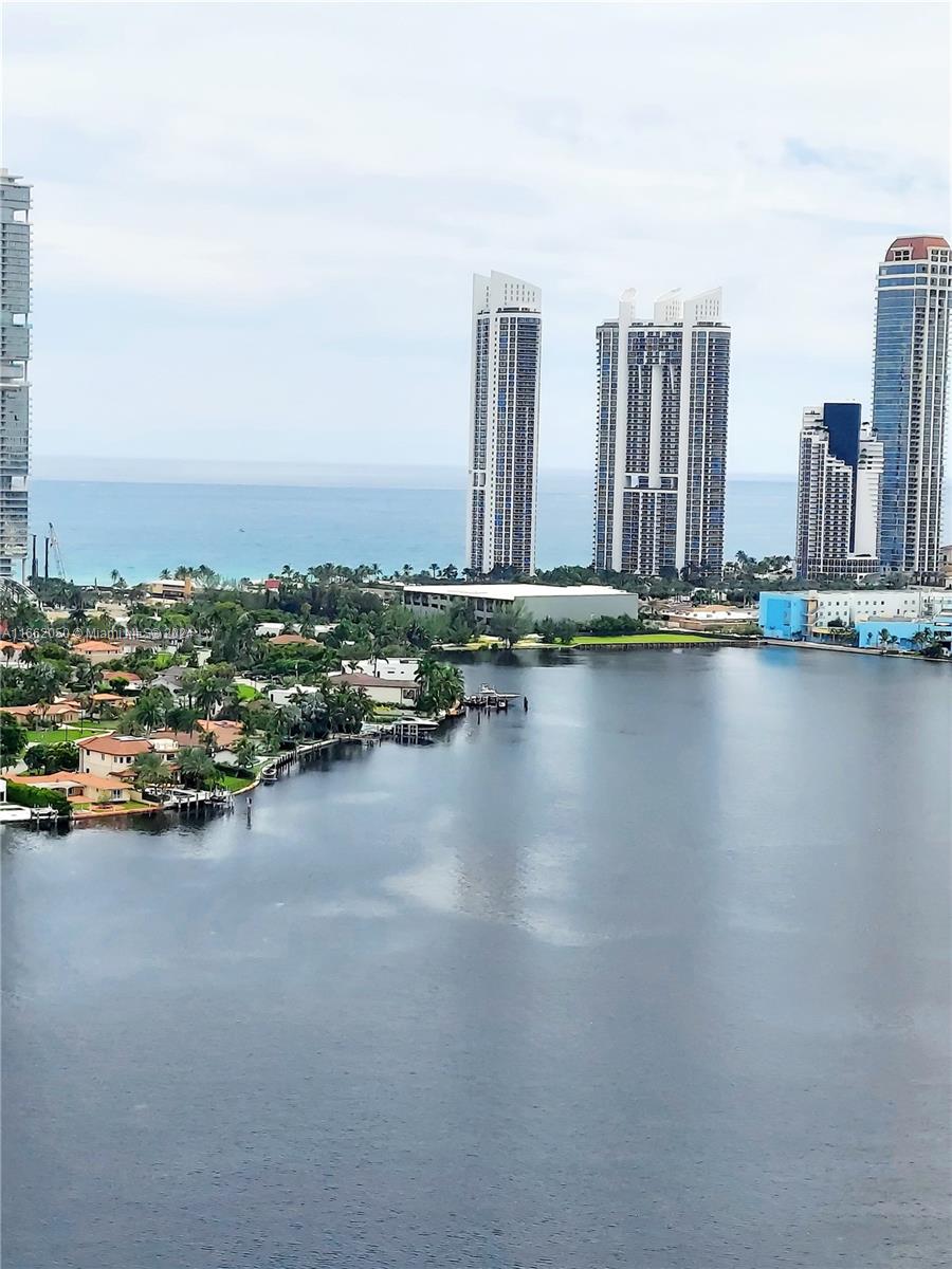 a view of a city with tall buildings