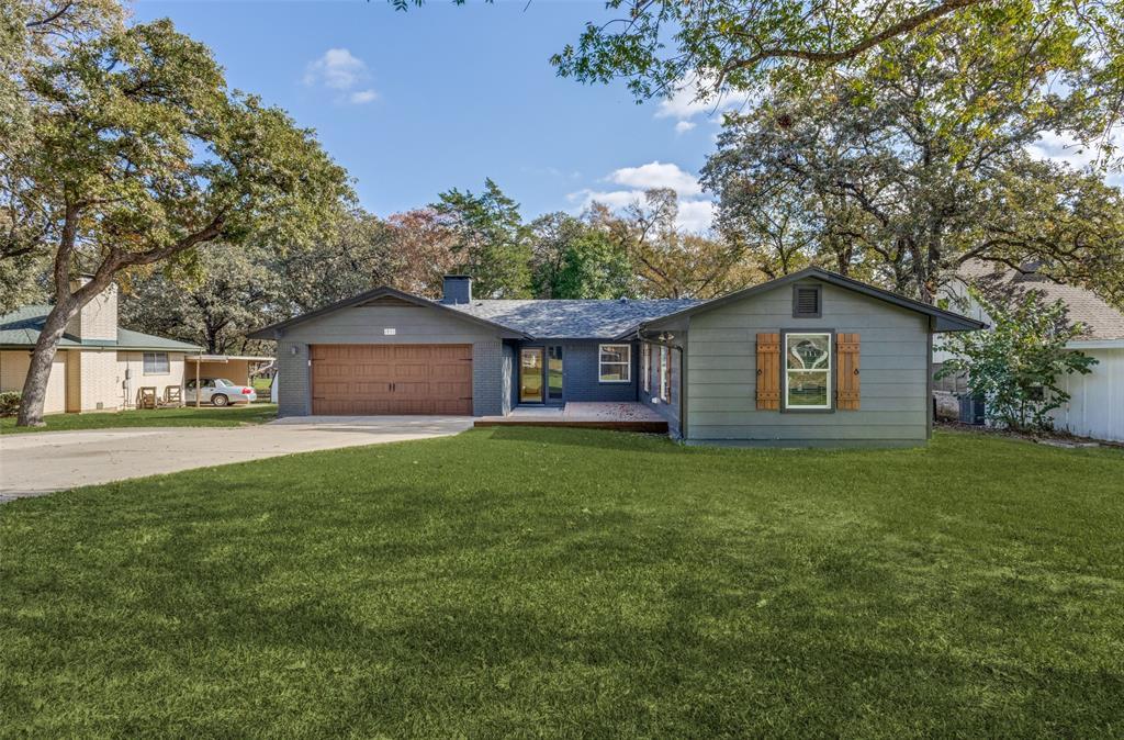 a house view with a garden space