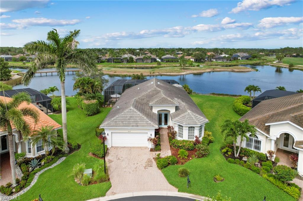 an aerial view of a house with outdoor space