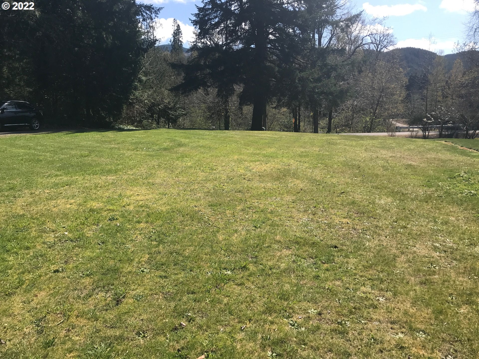 a view of an outdoor space and a yard