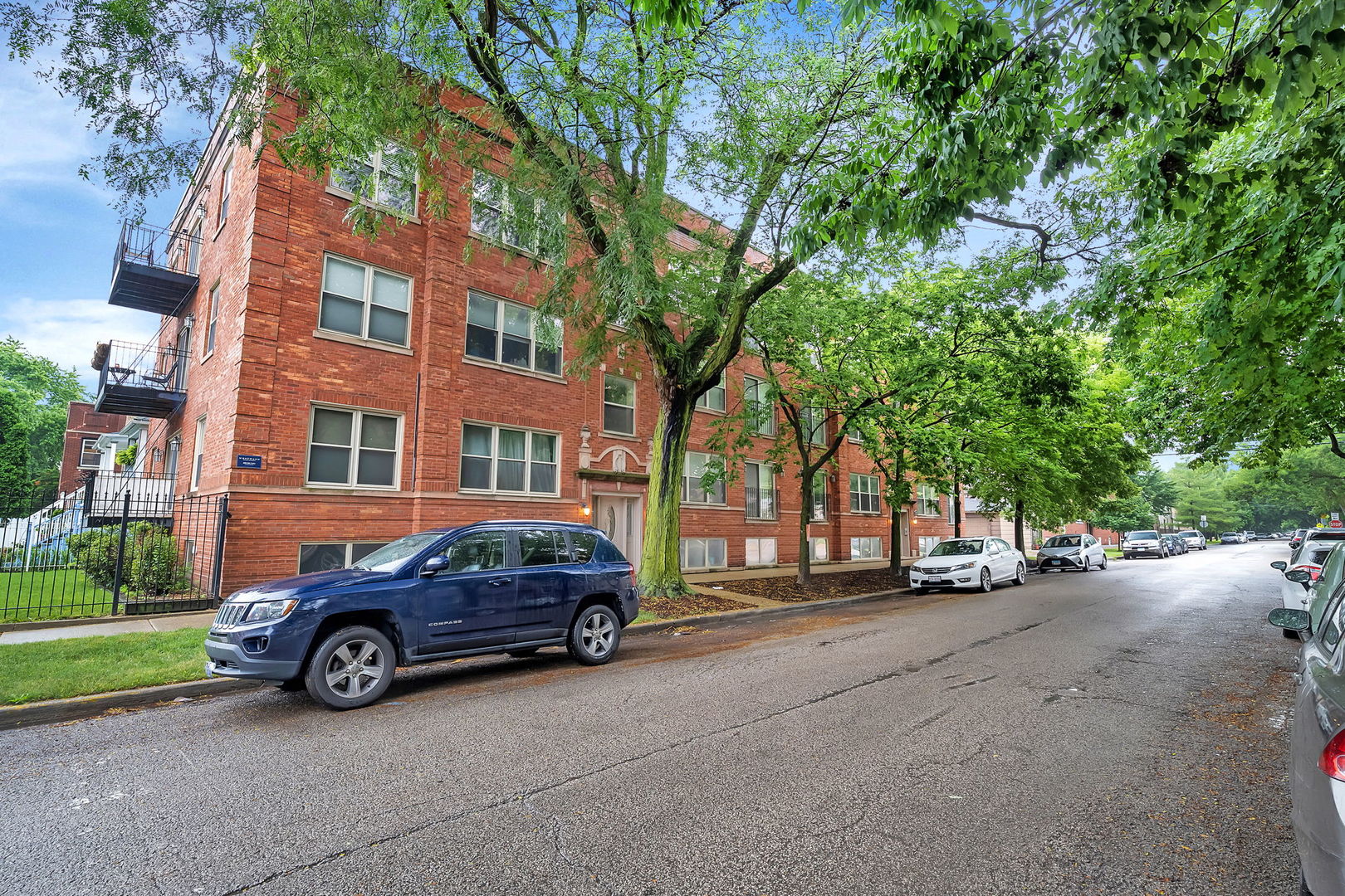 a car parked in front of a building