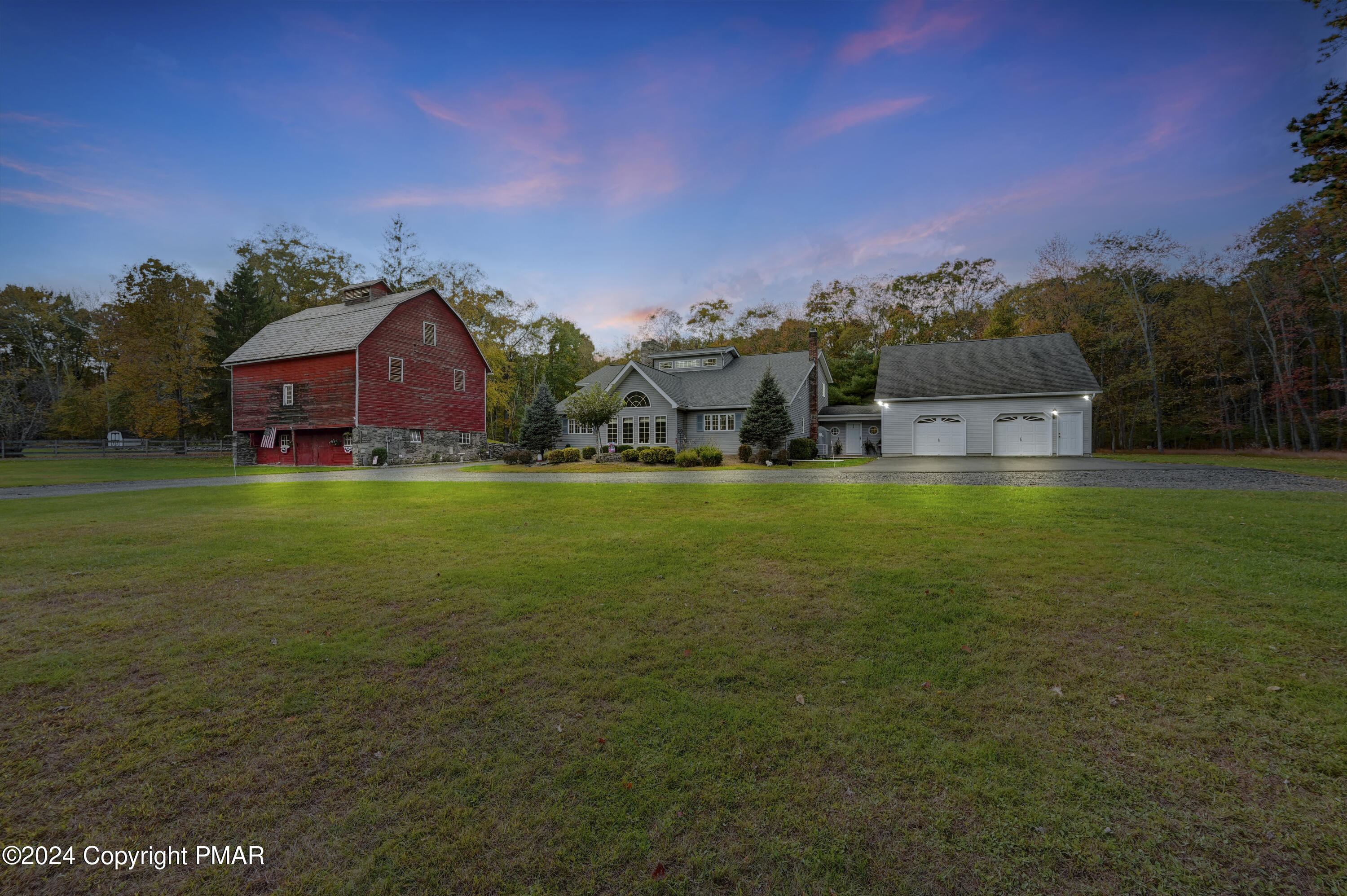 a view of a house with a big yard