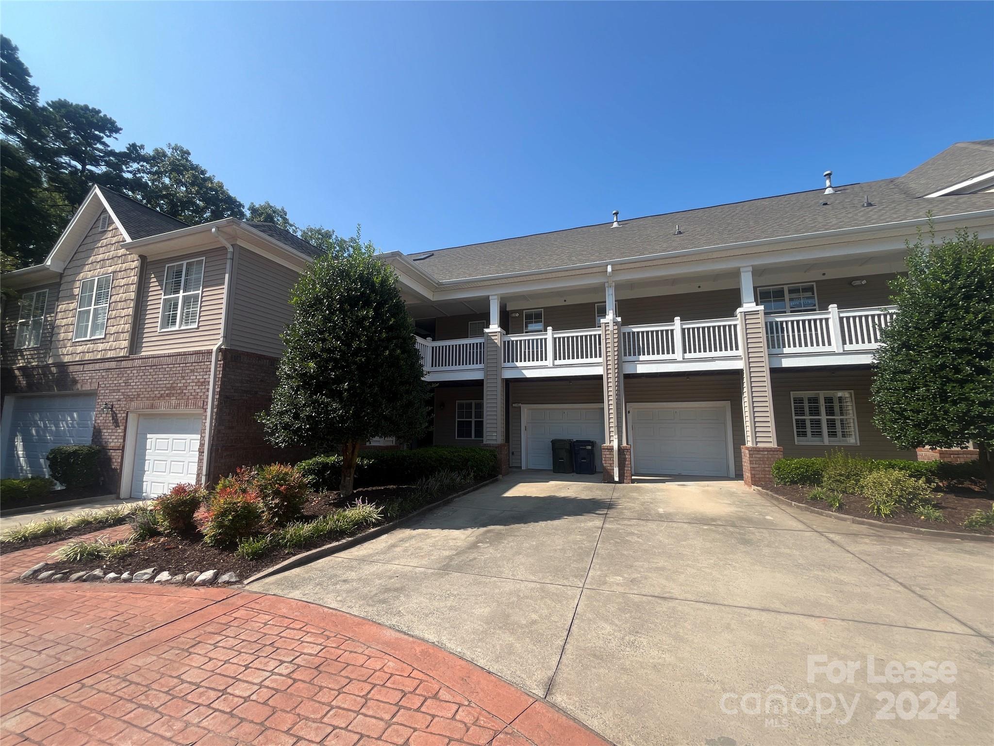 a view of house with outdoor space and porch