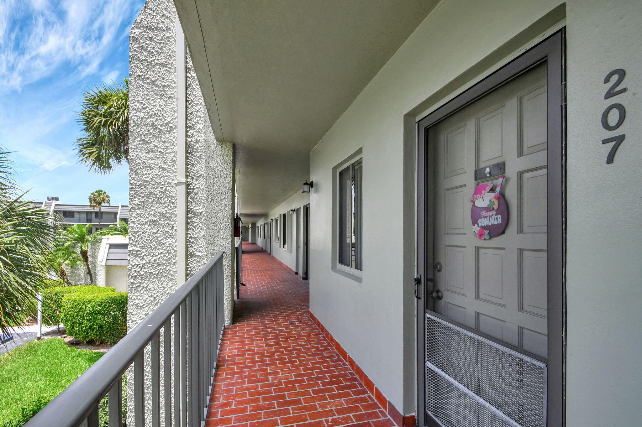 a view of a balcony with an outdoor space