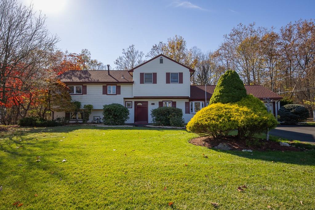 View of front of property featuring a front lawn