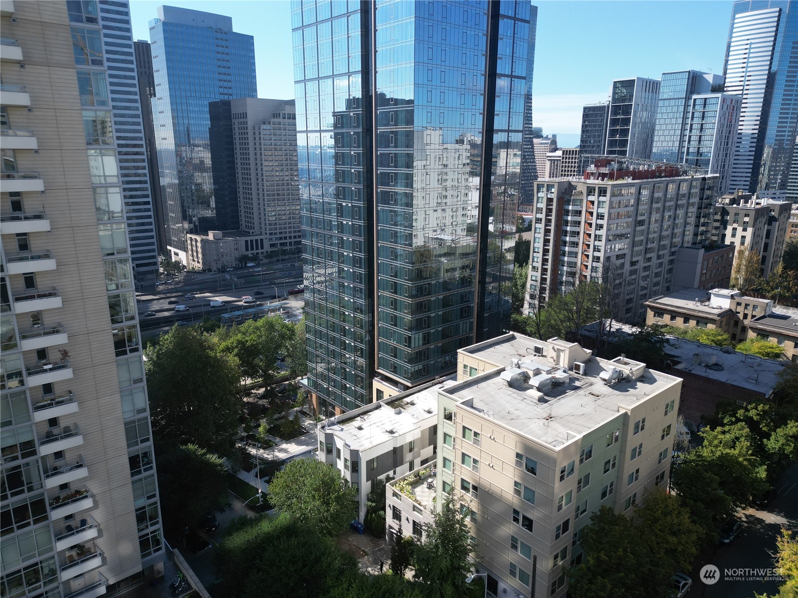 a view of a city with tall buildings