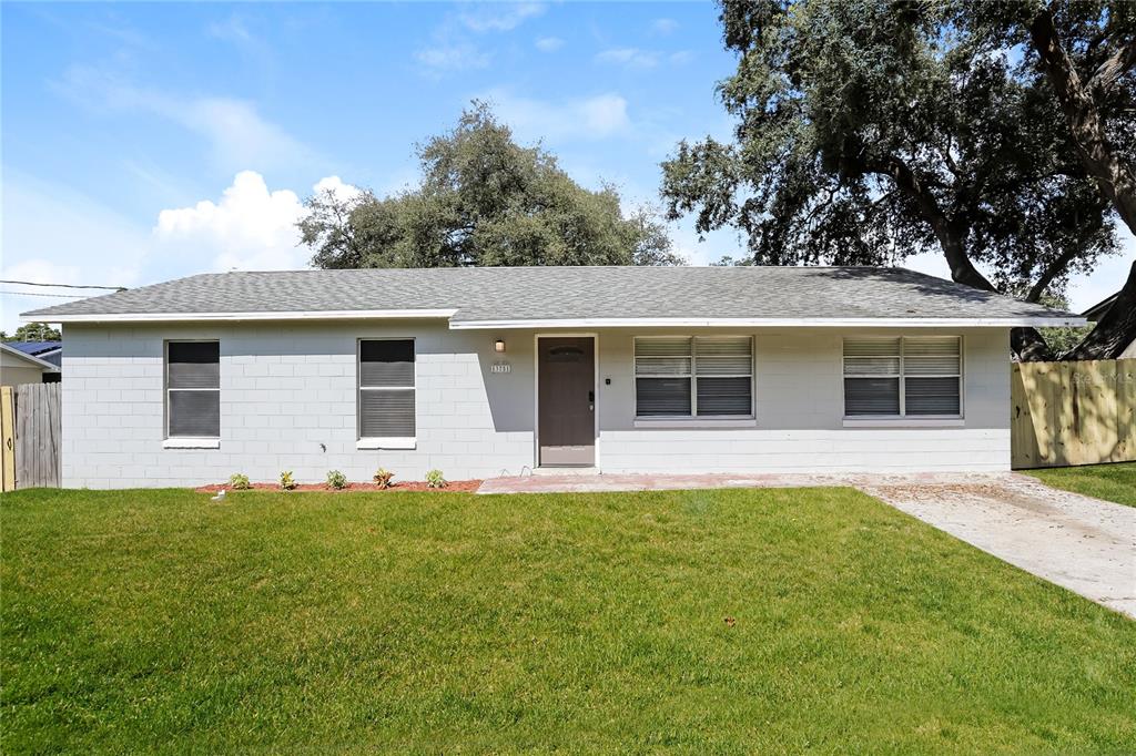 front view of a house with a yard