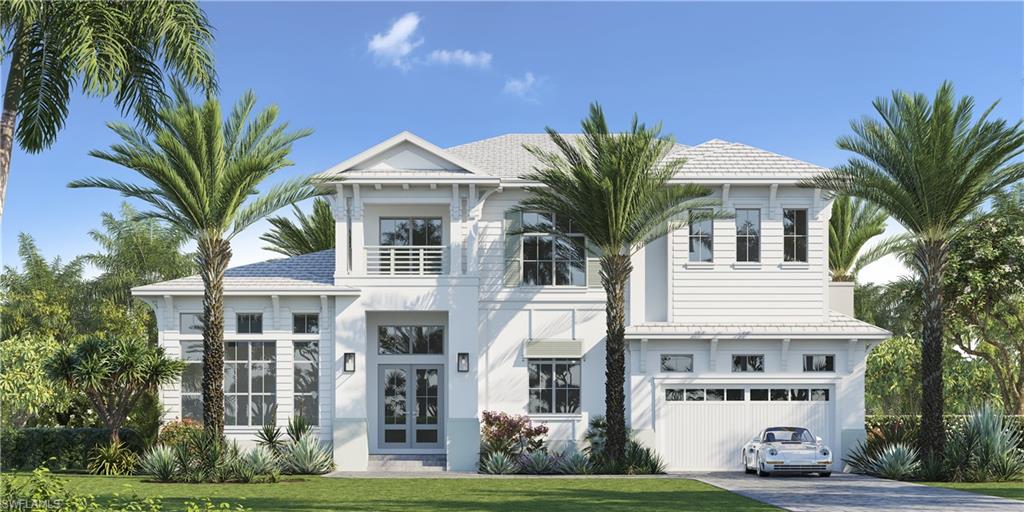 a view of white house with a yard and palm trees