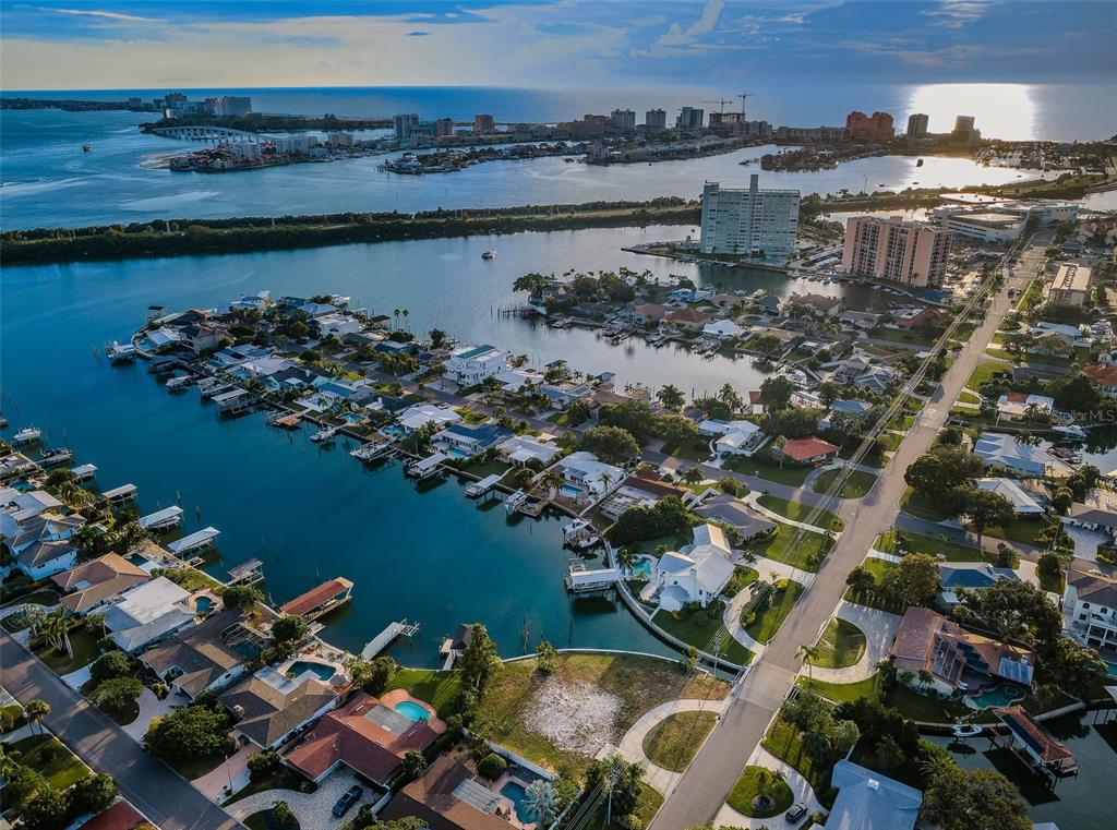 an aerial view of a house with a lake view