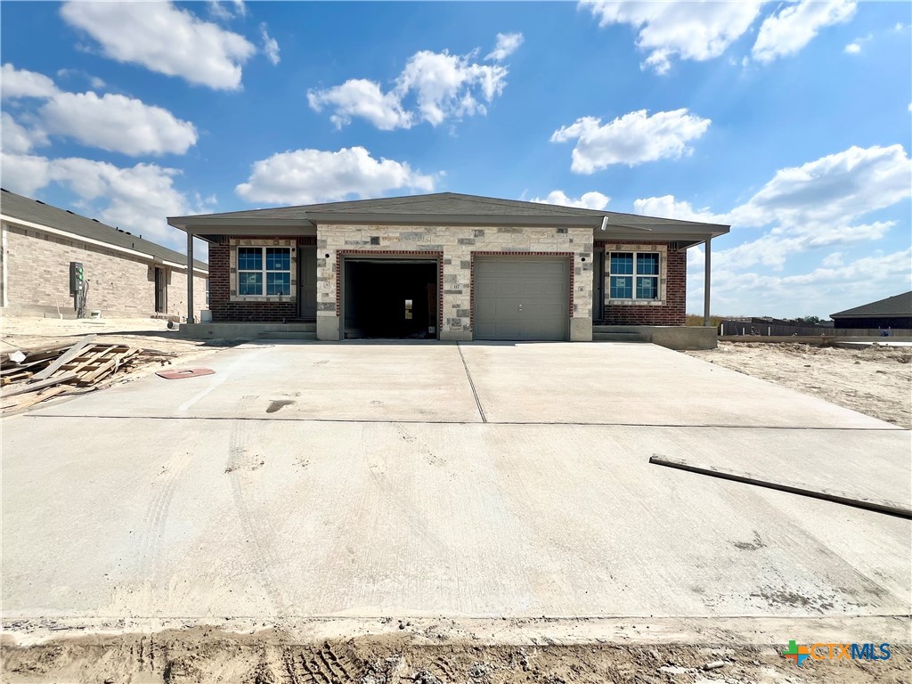 a front view of house with yard