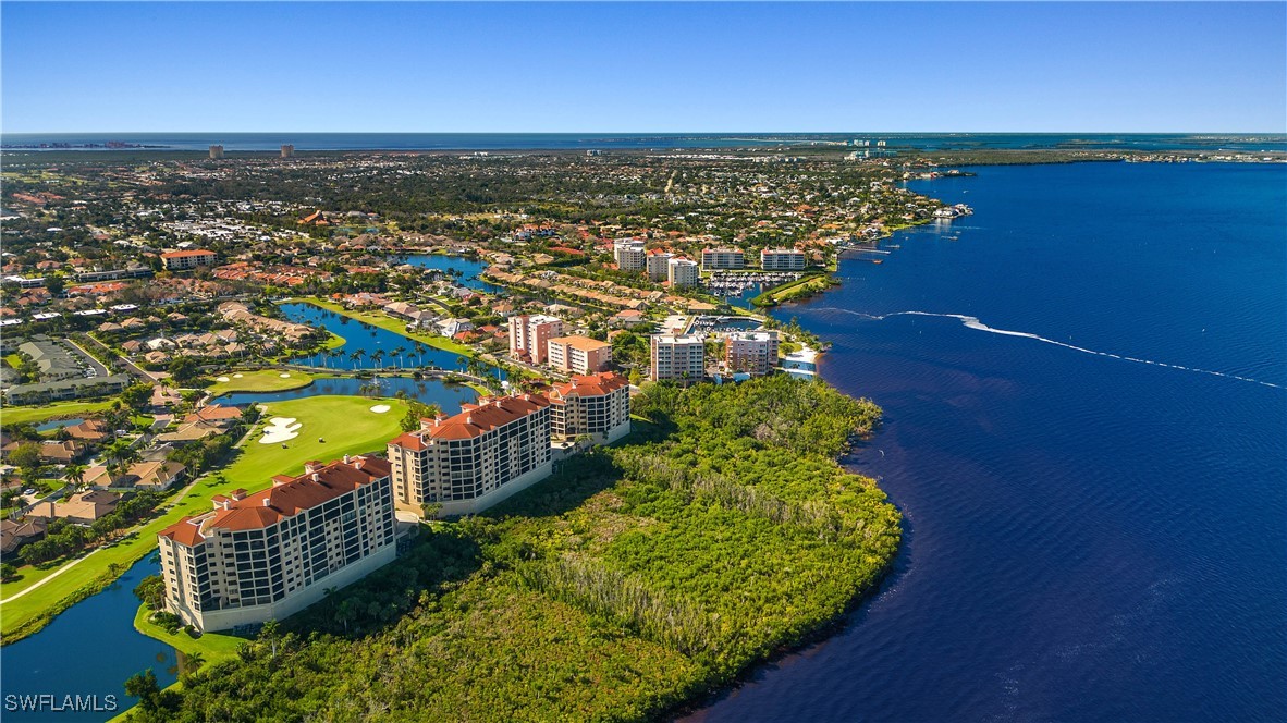 a view of a city with an ocean view