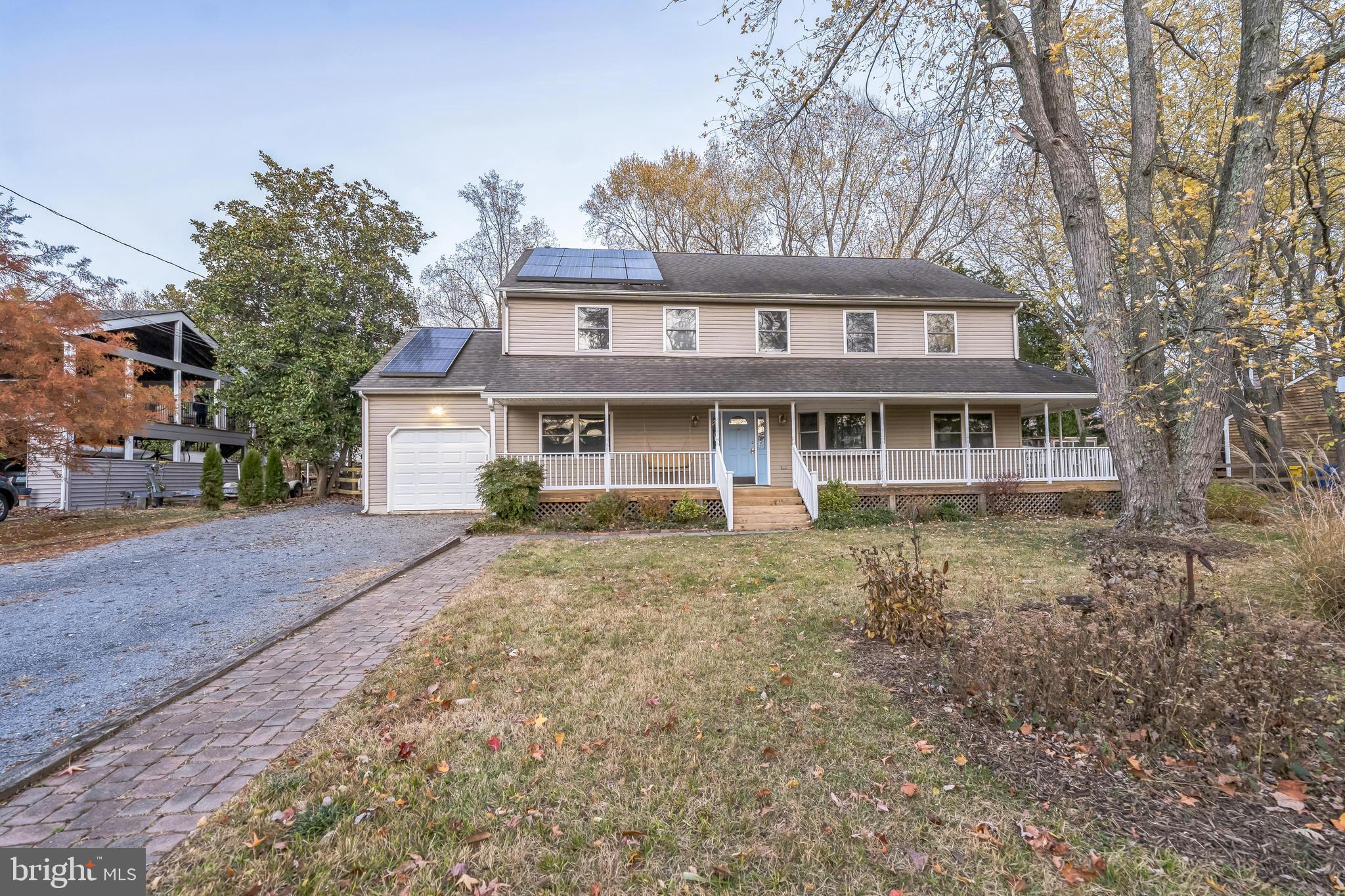 a view of a yard in front of a house