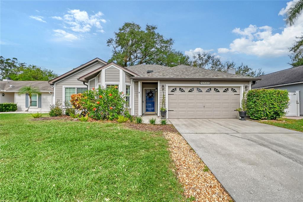 front view of a house with a yard