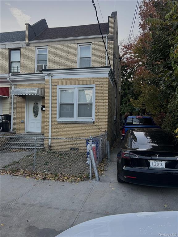 a car parked in front of a house