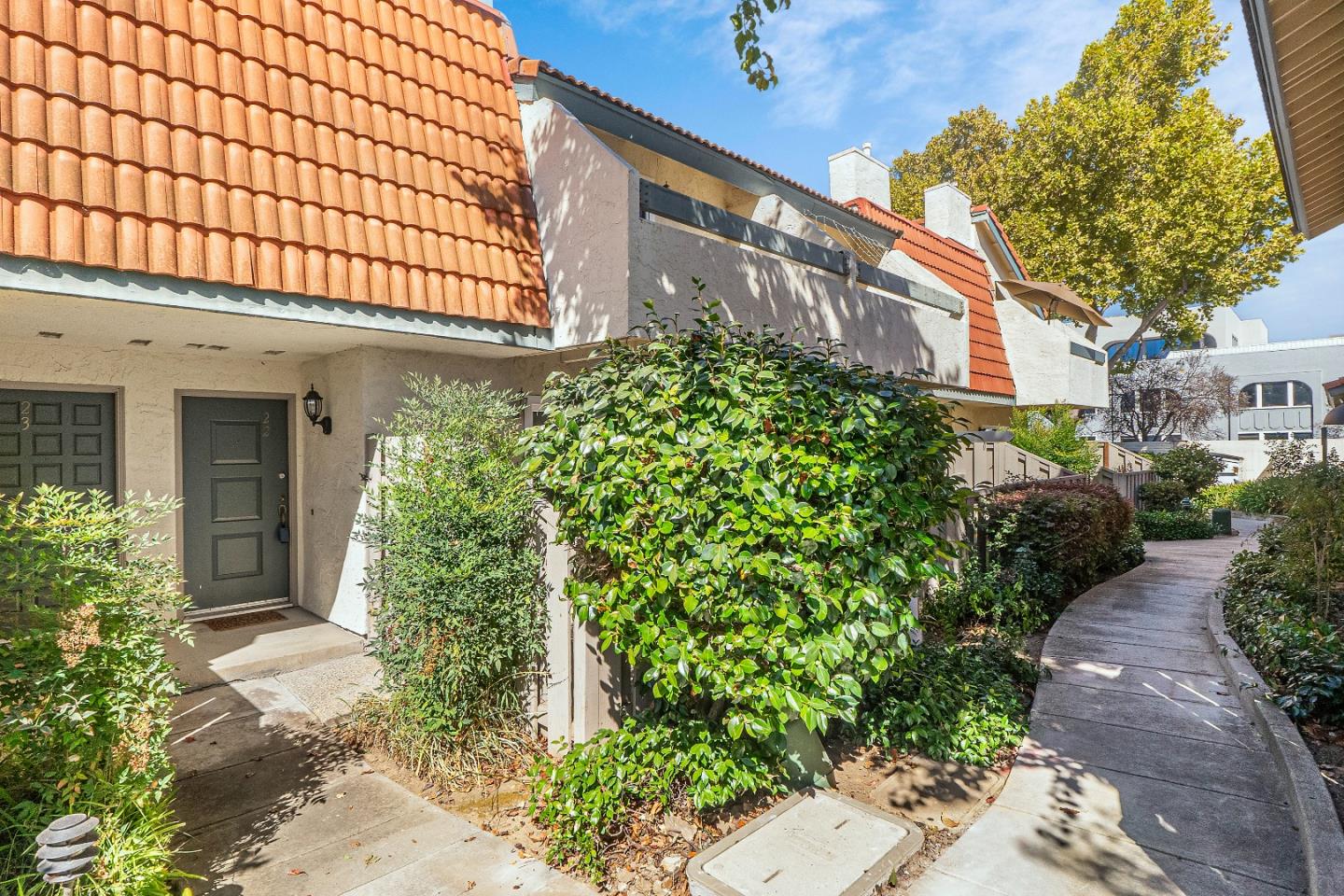 a view of a house with a garden