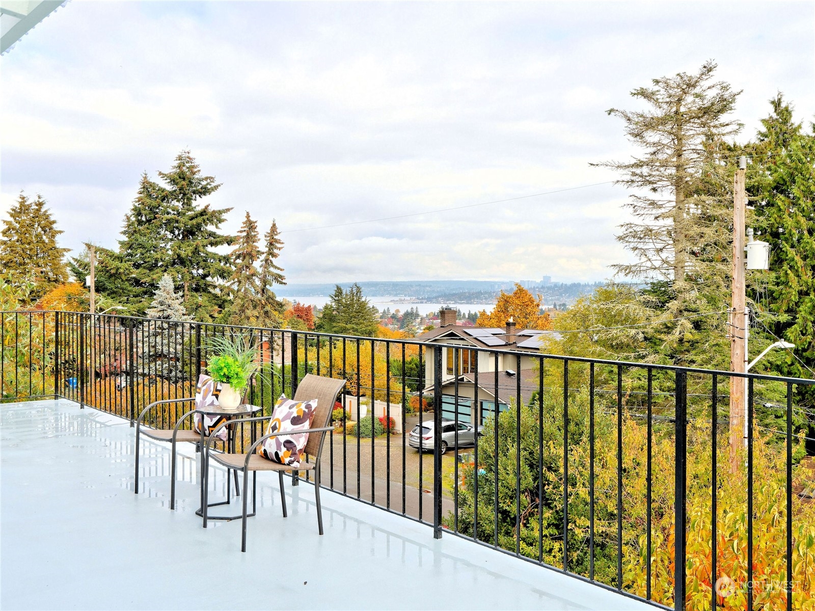 a view of a balcony with chairs