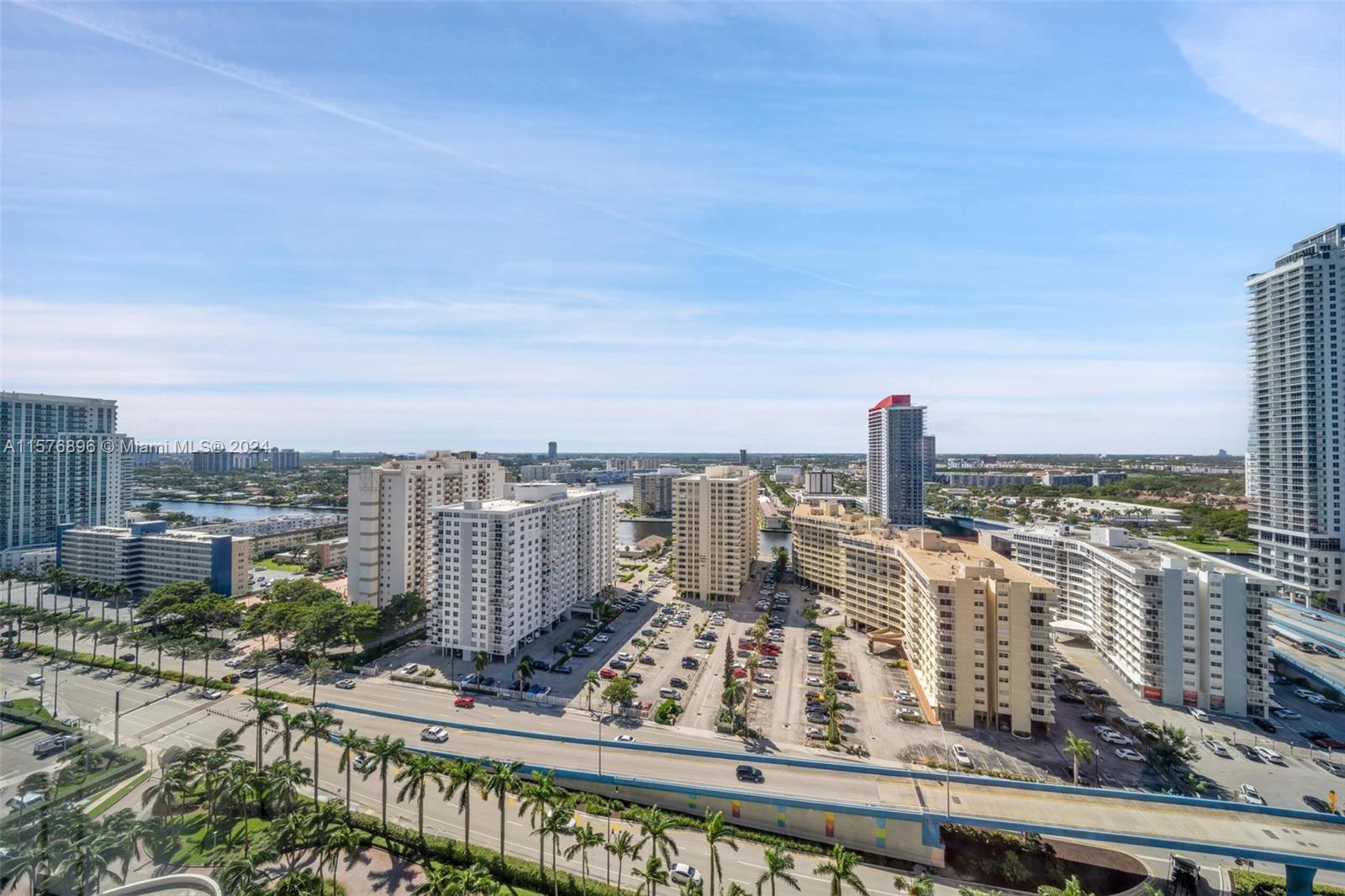 a view of a city with tall buildings