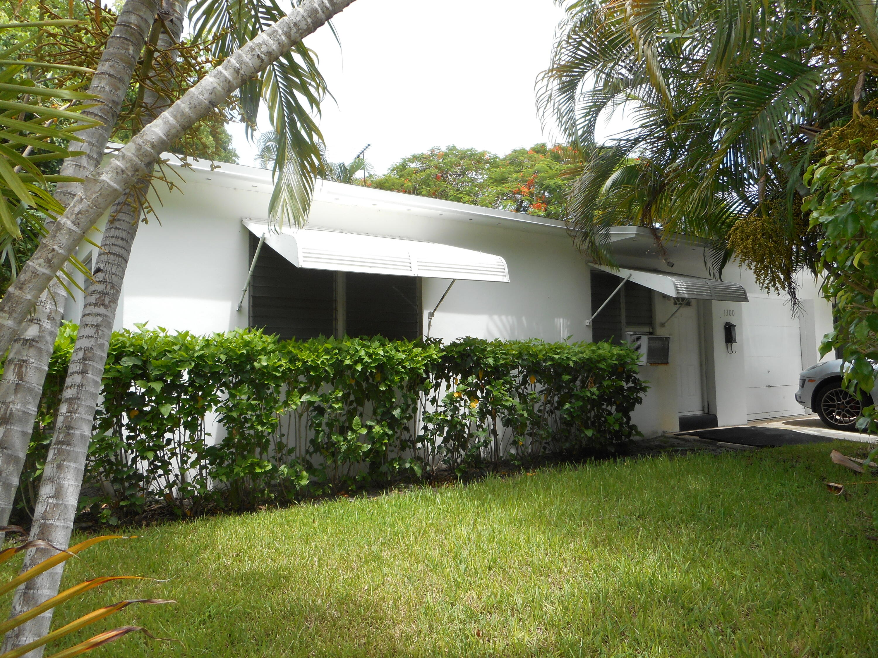 a view of a house with a garden