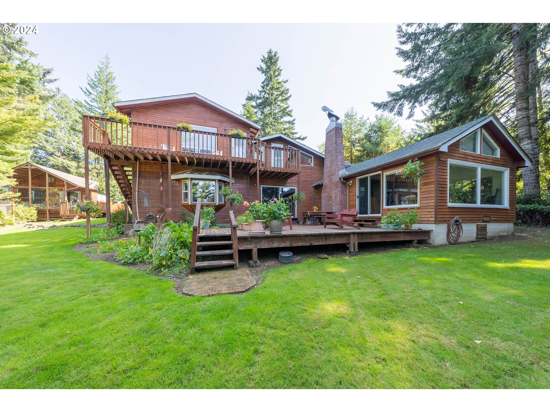 a view of a house with a yard porch and sitting area