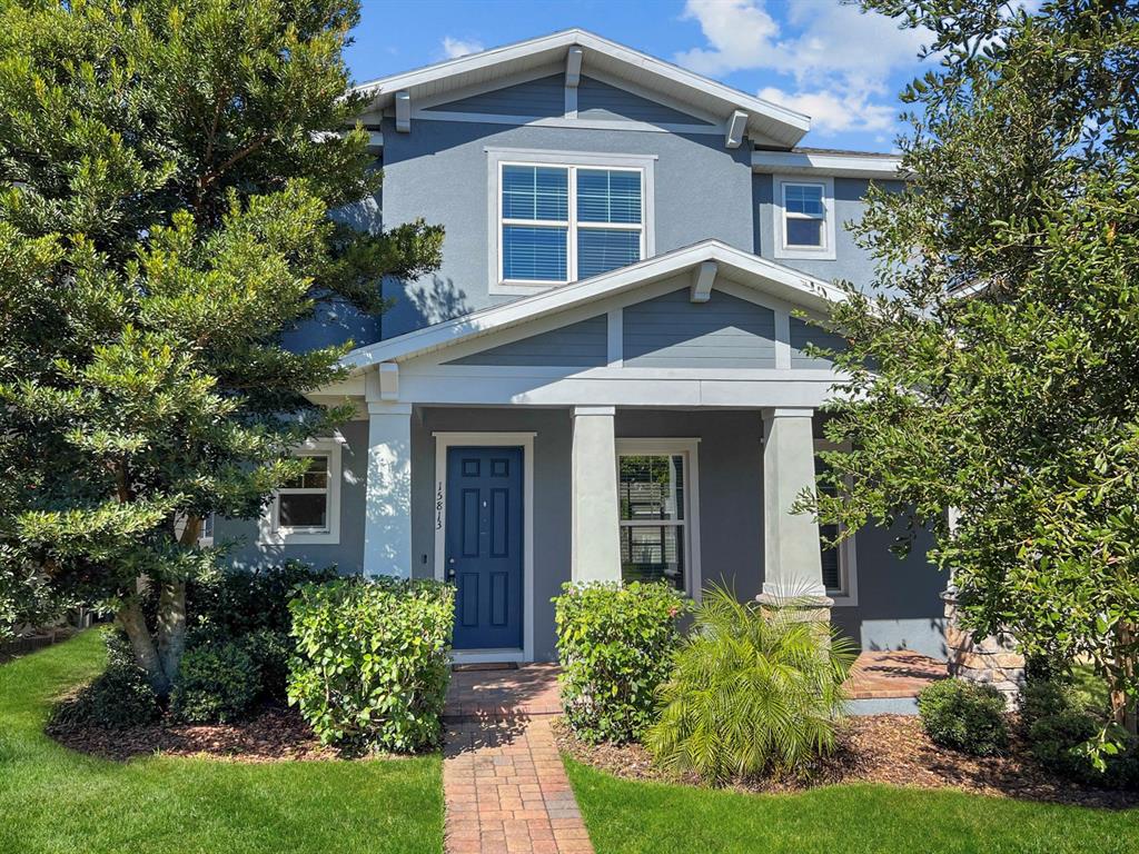 front view of a house with a yard