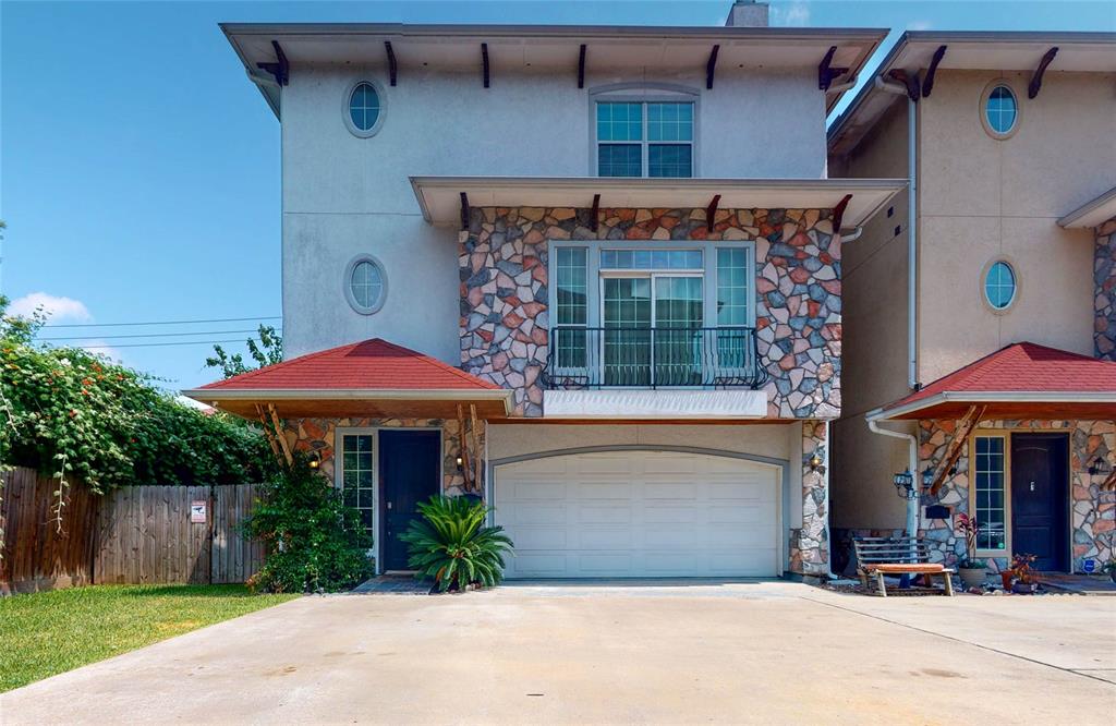 a front view of a house with yard