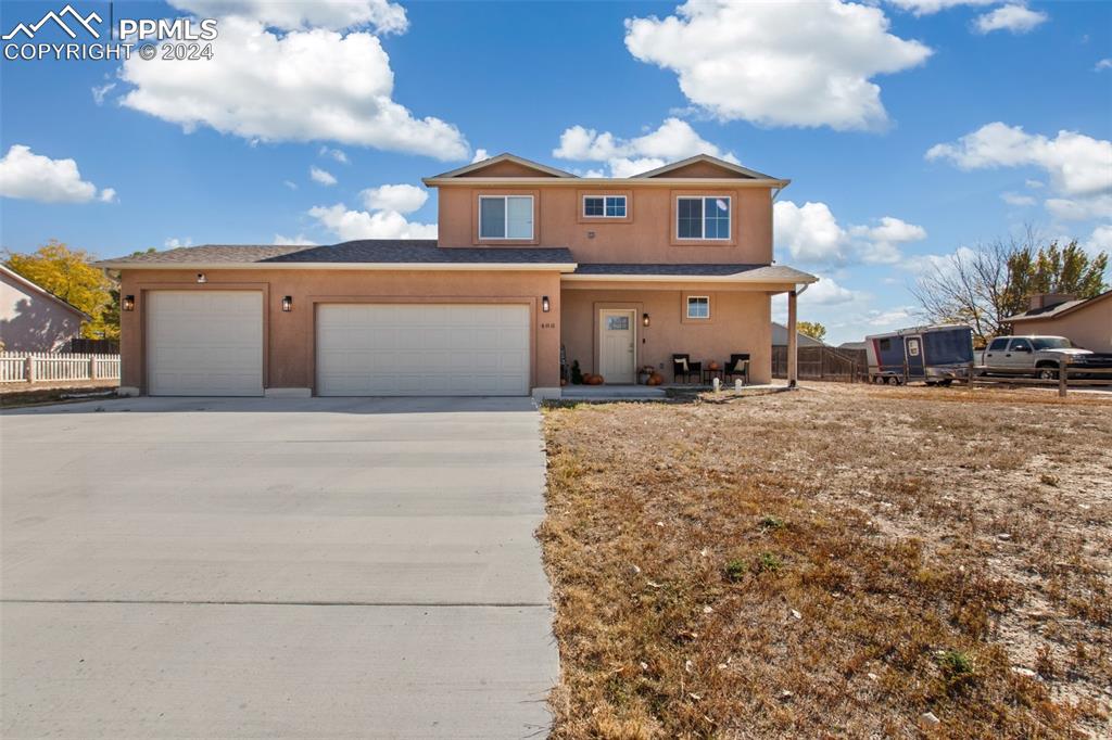 View of front of house with garage