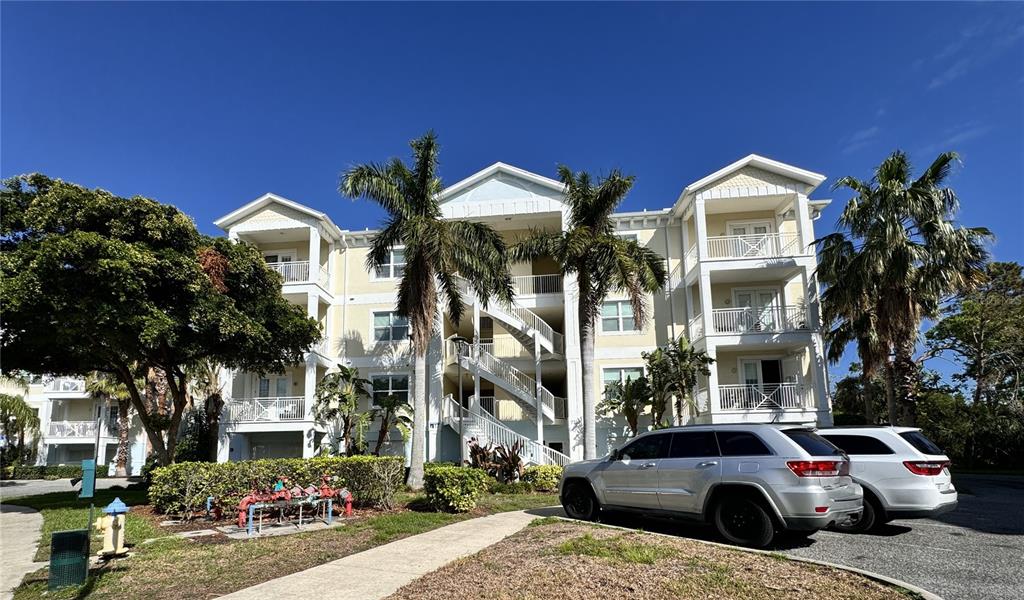 a view of multiple houses with a yard