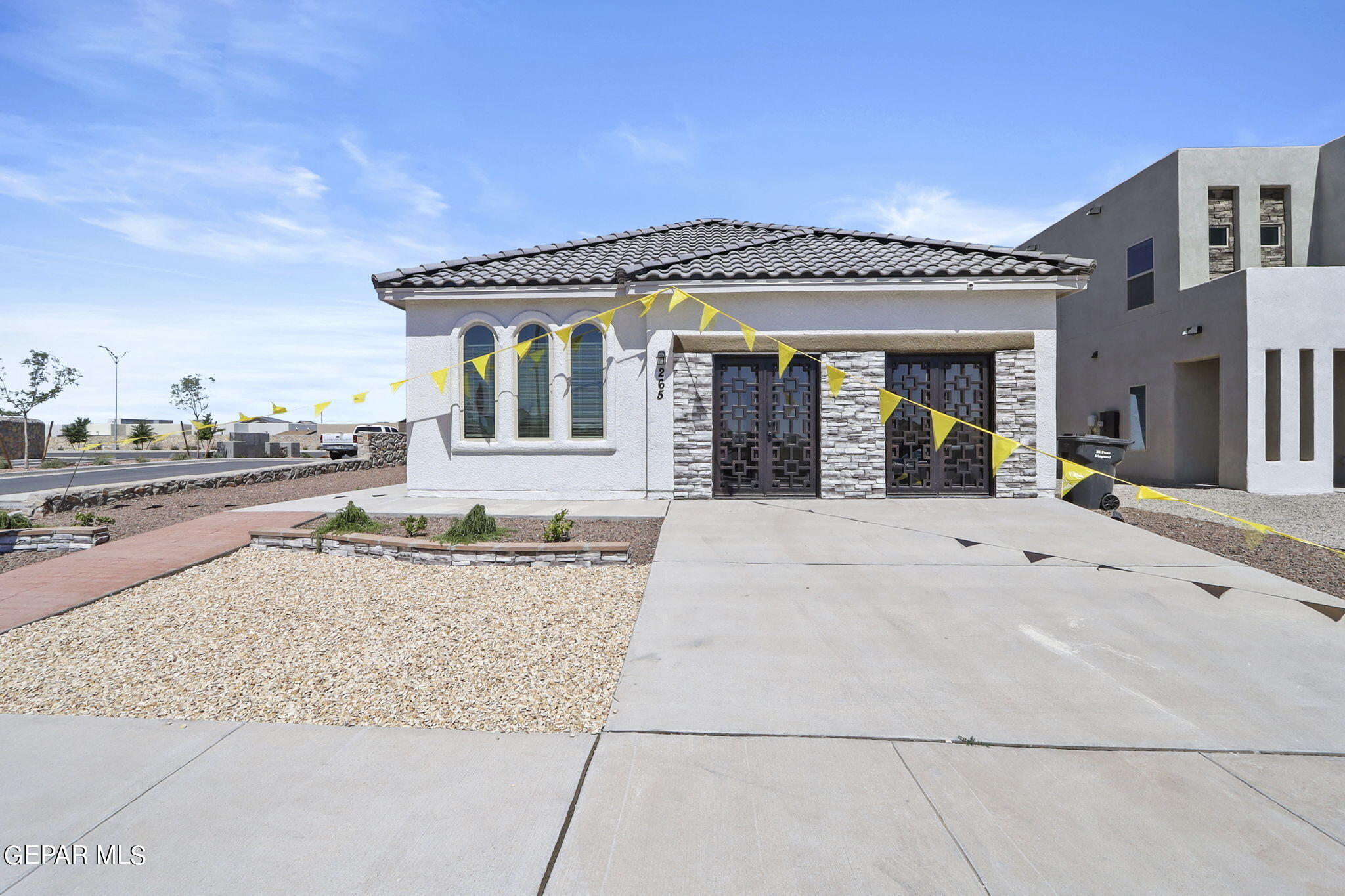 front view of a house with a terrace