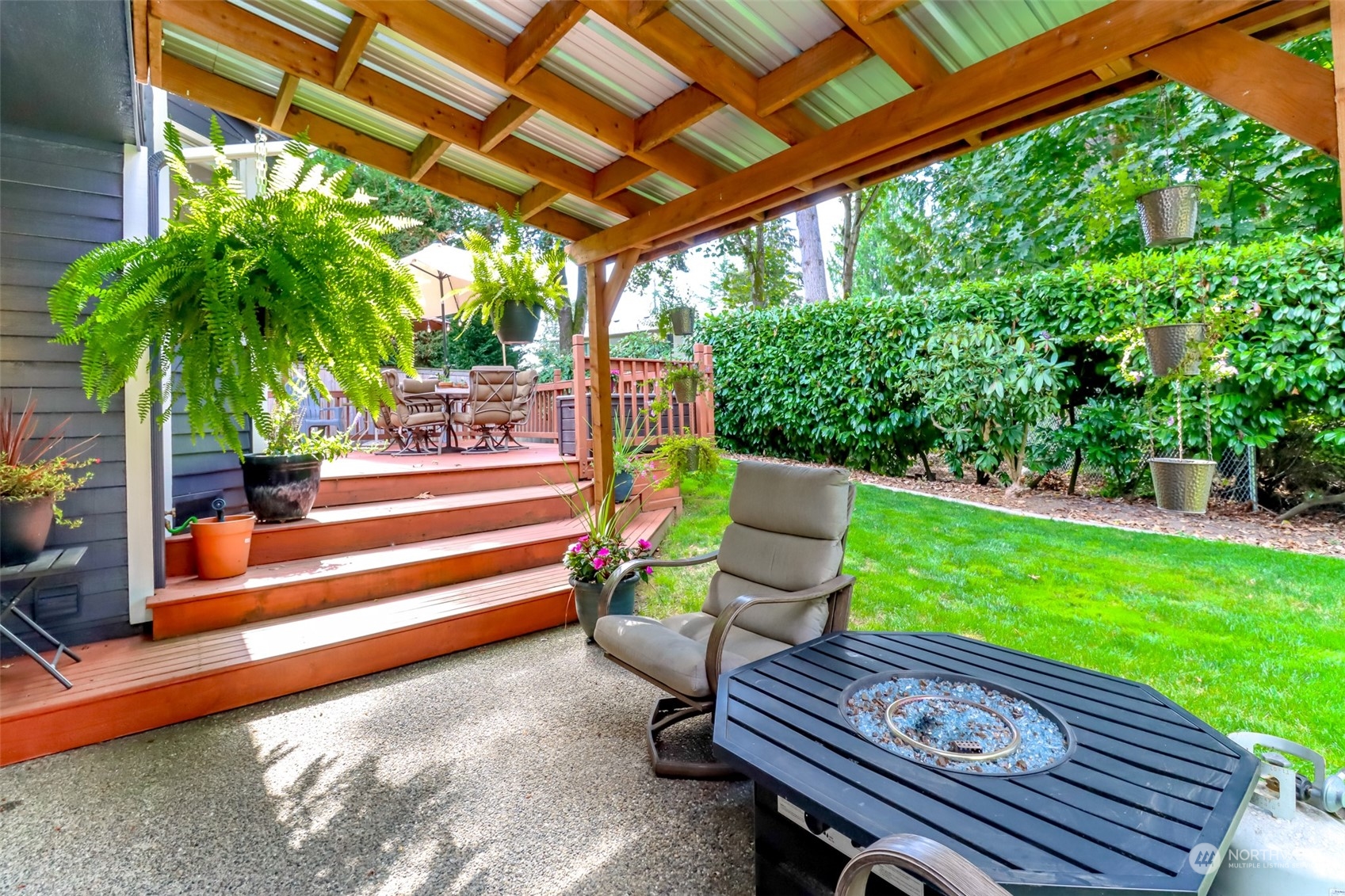 a garden view with a seating space