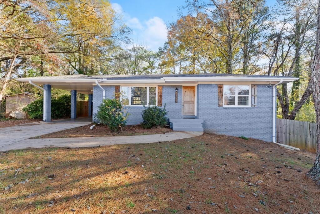 front view of a house with a yard