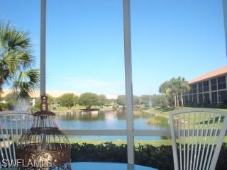 a view of a lake from a balcony