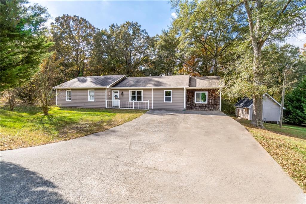 front view of a house with a yard