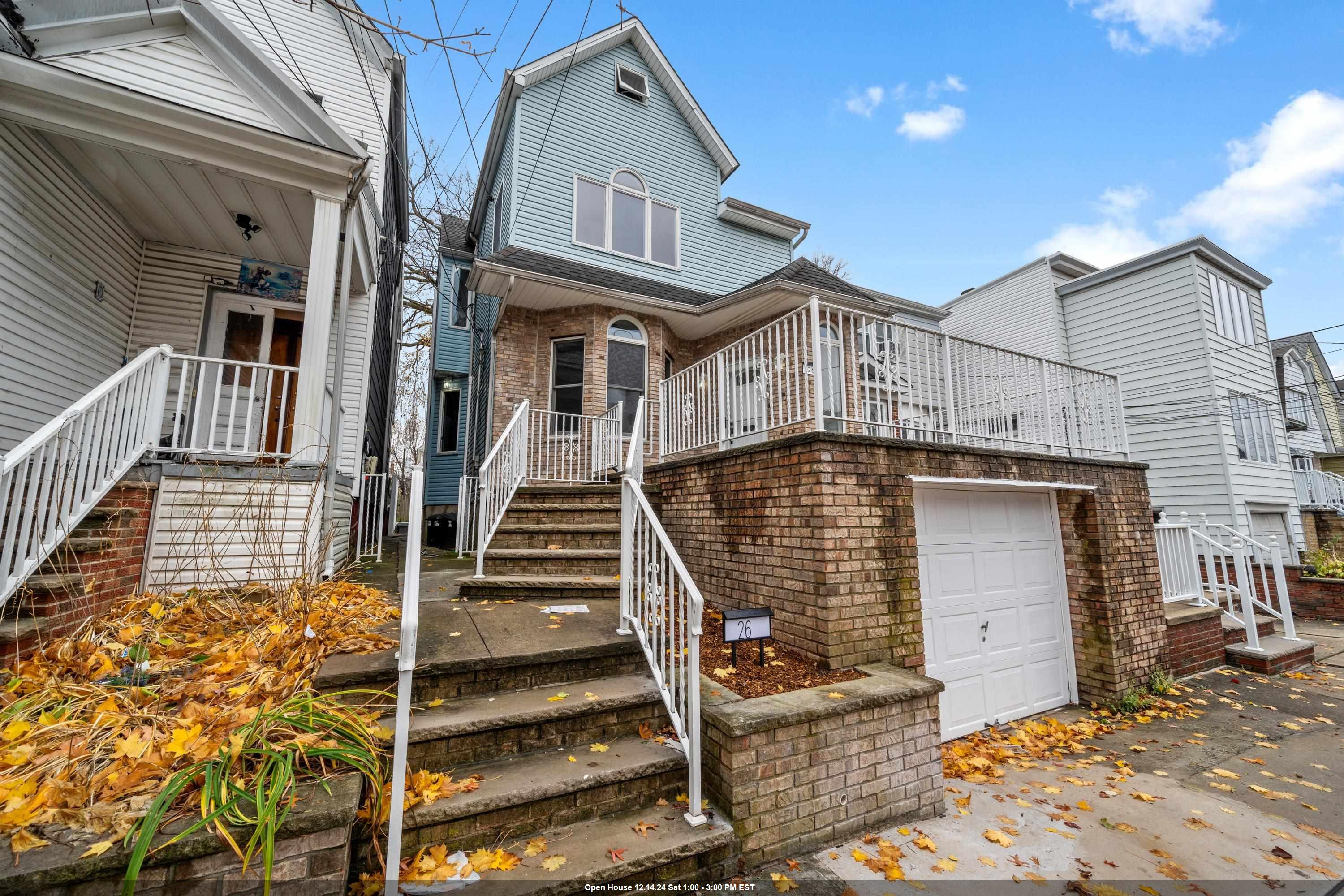 a view of a house with wooden stairs