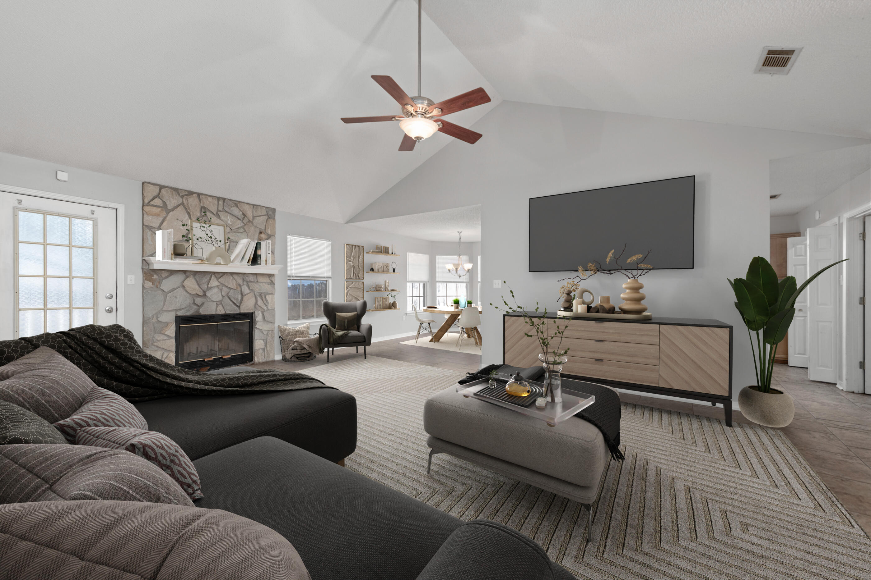 a living room with furniture a fireplace and a flat screen tv