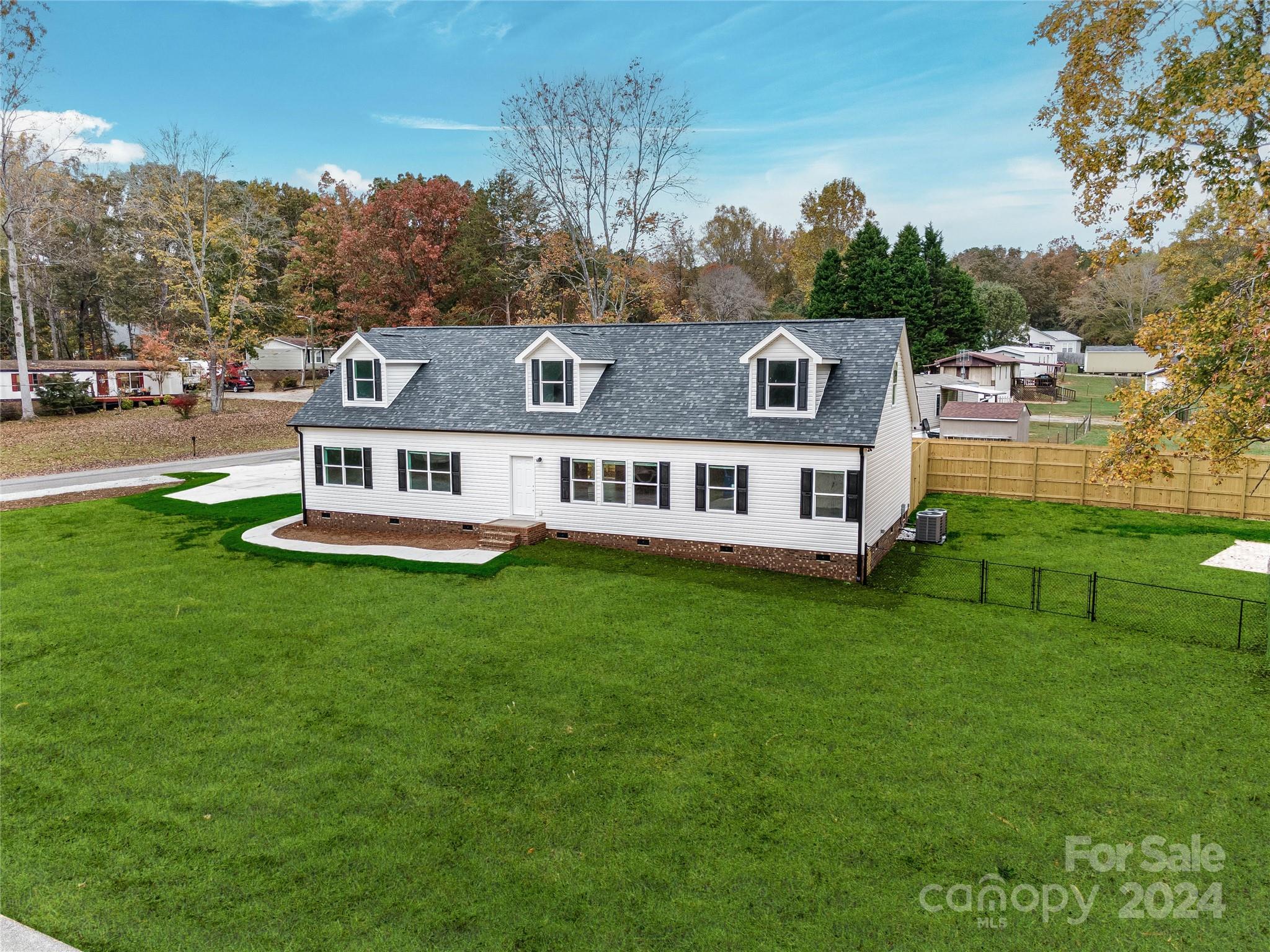 a aerial view of a house with a garden