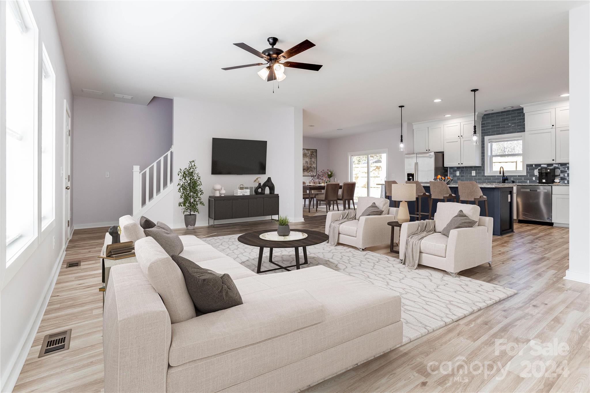 a living room with furniture fireplace and a flat screen tv