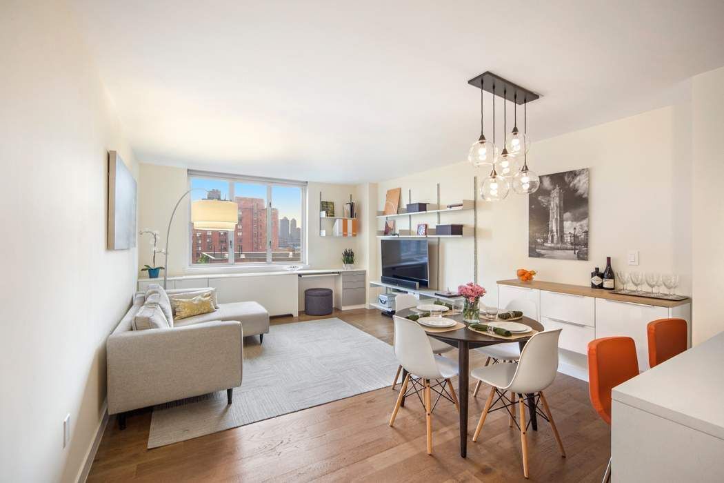 a living room with furniture and a table