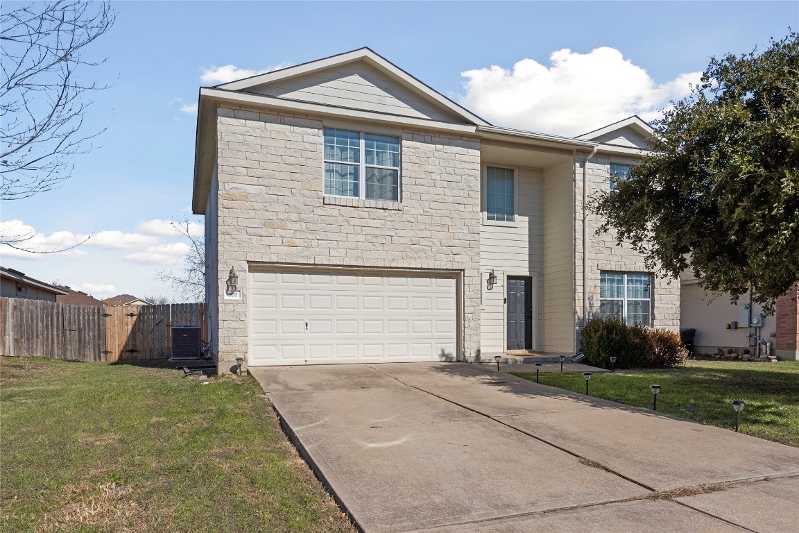 a front view of house with yard