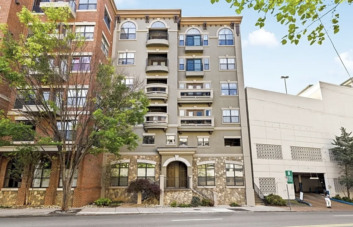 a front view of a building with street view