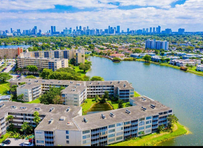 a view of a city with a lake