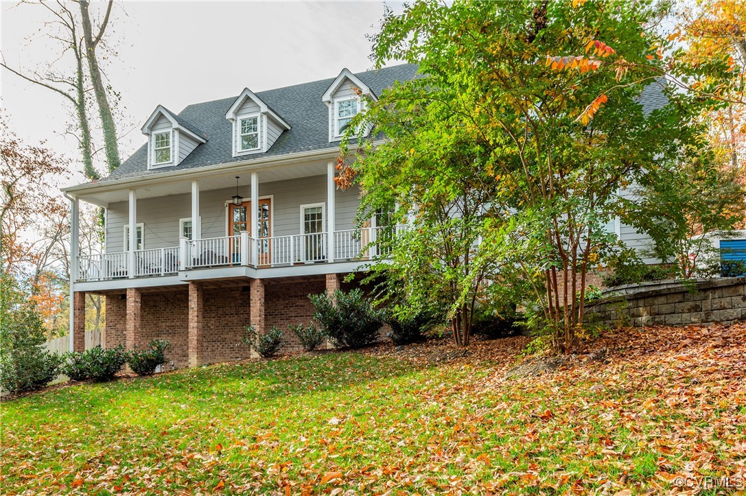 View of front of property featuring a porch and a