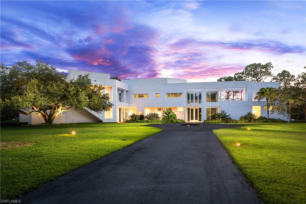 Modern home featuring a lawn