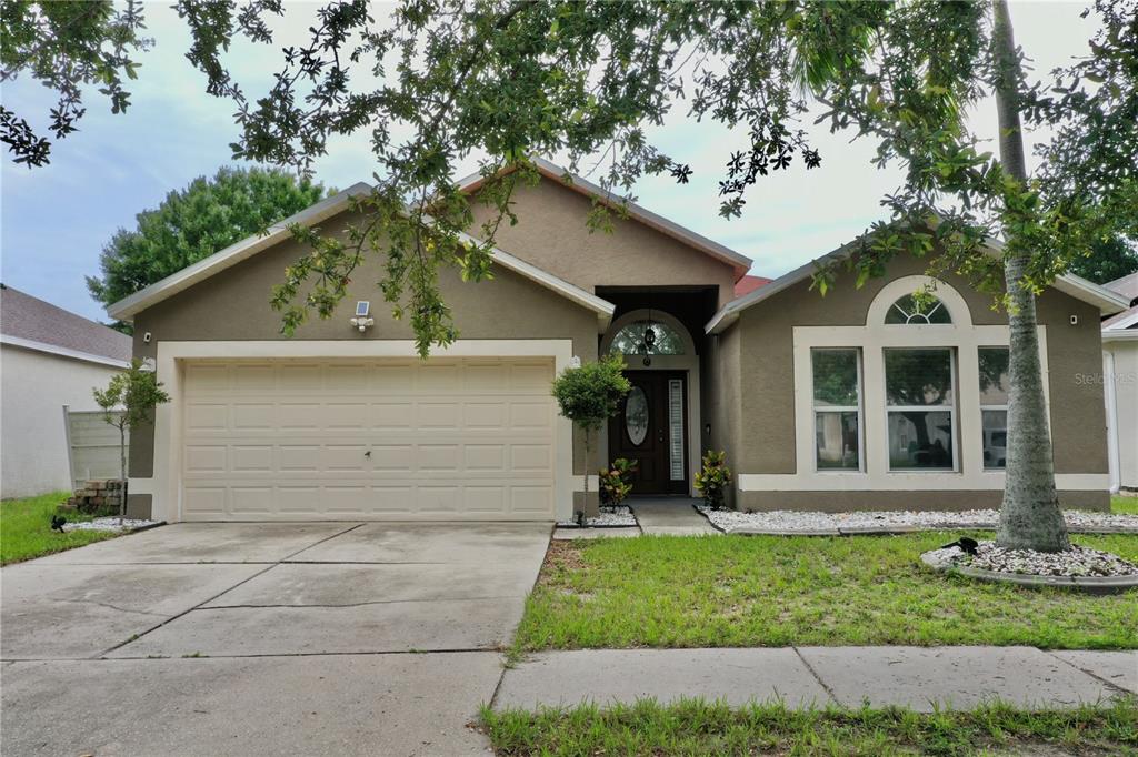 front view of a house with a yard